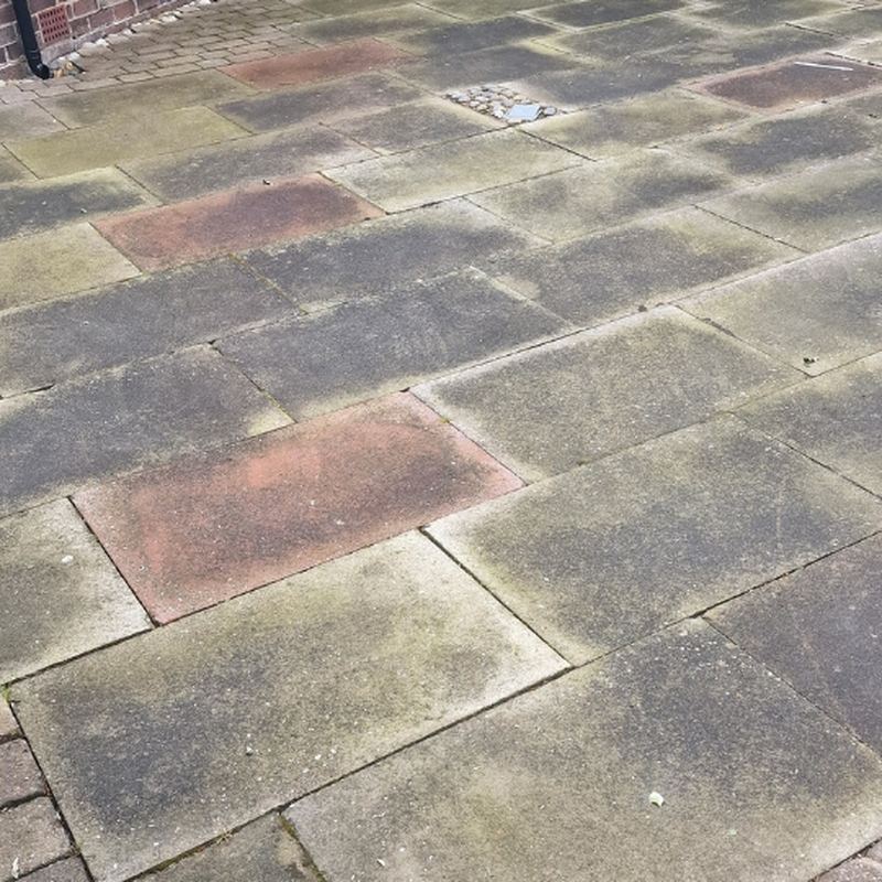 Before: Flagged driveway clean, Golborne